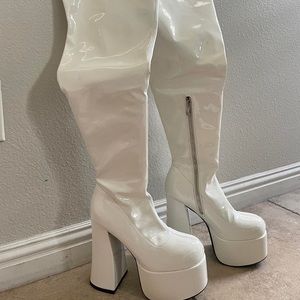 Brand new never worn white platform knee high boots!